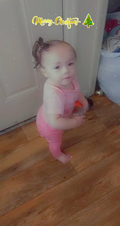 La'Chell Faith joined the competition — help win amazing prizes! baby, baby_toddler_clothing, barefoot, cheek, floor, flooring, foot, hardwood, head, human_leg, laminate_flooring, person, room, sleeve, thigh, thumb, toddler, varnish, wood, wood_flooring