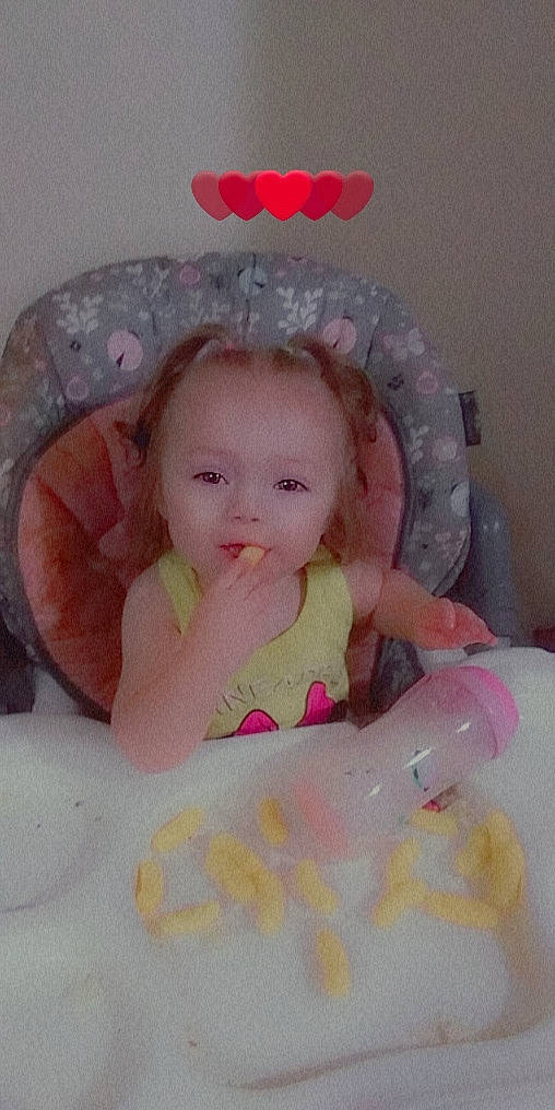 Jayleigh joined the competition — help win amazing prizes! baby, baby_safety, baby_toddler_clothing, cap, cheek, child, comfort, costume_hat, dress, eye, fashion_accessory, happy, headgear, linens, person, pink, room, sitting, sleeve, smile