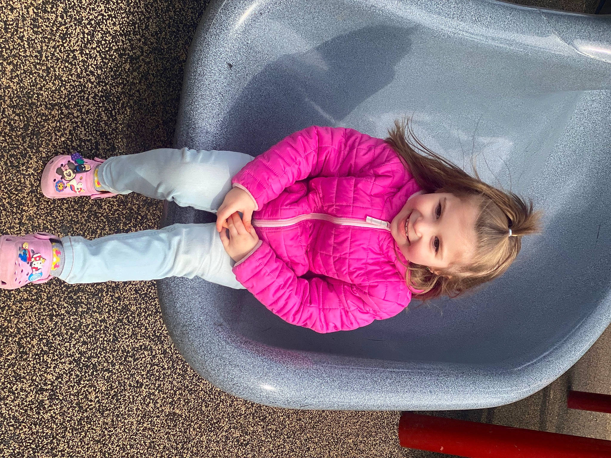 Nicole is registered to the contest to win money with this photo: baby_toddler_clothing, child, comfort, cool, electric_blue, fun, happy, human_leg, joy, leisure, magenta, person, pink, product, purple, sitting, tints_and_shades, toddler, tree, vehicle_door