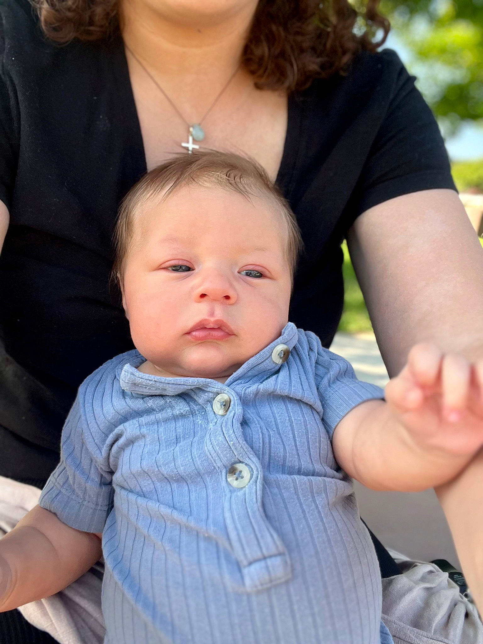 Fletcher is registered to the contest to win money with this photo: baby, baby_toddler_clothing, cheek, child, chin, face, finger, gesture, grass, hairstyle, happy, head, iris, person, shoulder, sitting, skin, sleeve, standing, thumb