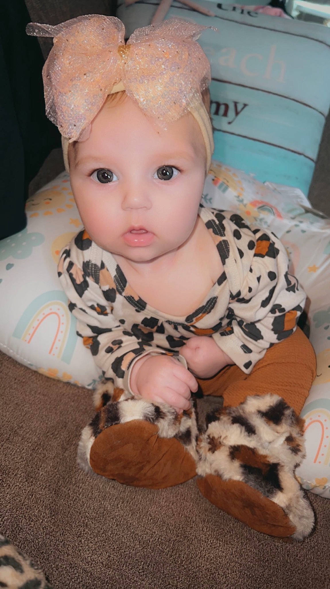 Skyla joined the competition — help win amazing prizes! baby, baby_toddler_clothing, child, comfort, companion_dog, eyelash, fashion_accessory, felidae, flooring, fur, head, headwear, iris, jewellery, pattern, person, room, sitting, sleeve, small_to_medium_sized_cats