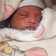 Andrew Sanz joined the competition — help win amazing prizes! newborn, baby, sleeping, blanket, soft, cozy, wrapped, infant, cute, pastel_colors, headwear, peaceful, face, closeup, warm, indoors, resting, child, toddler, portrait