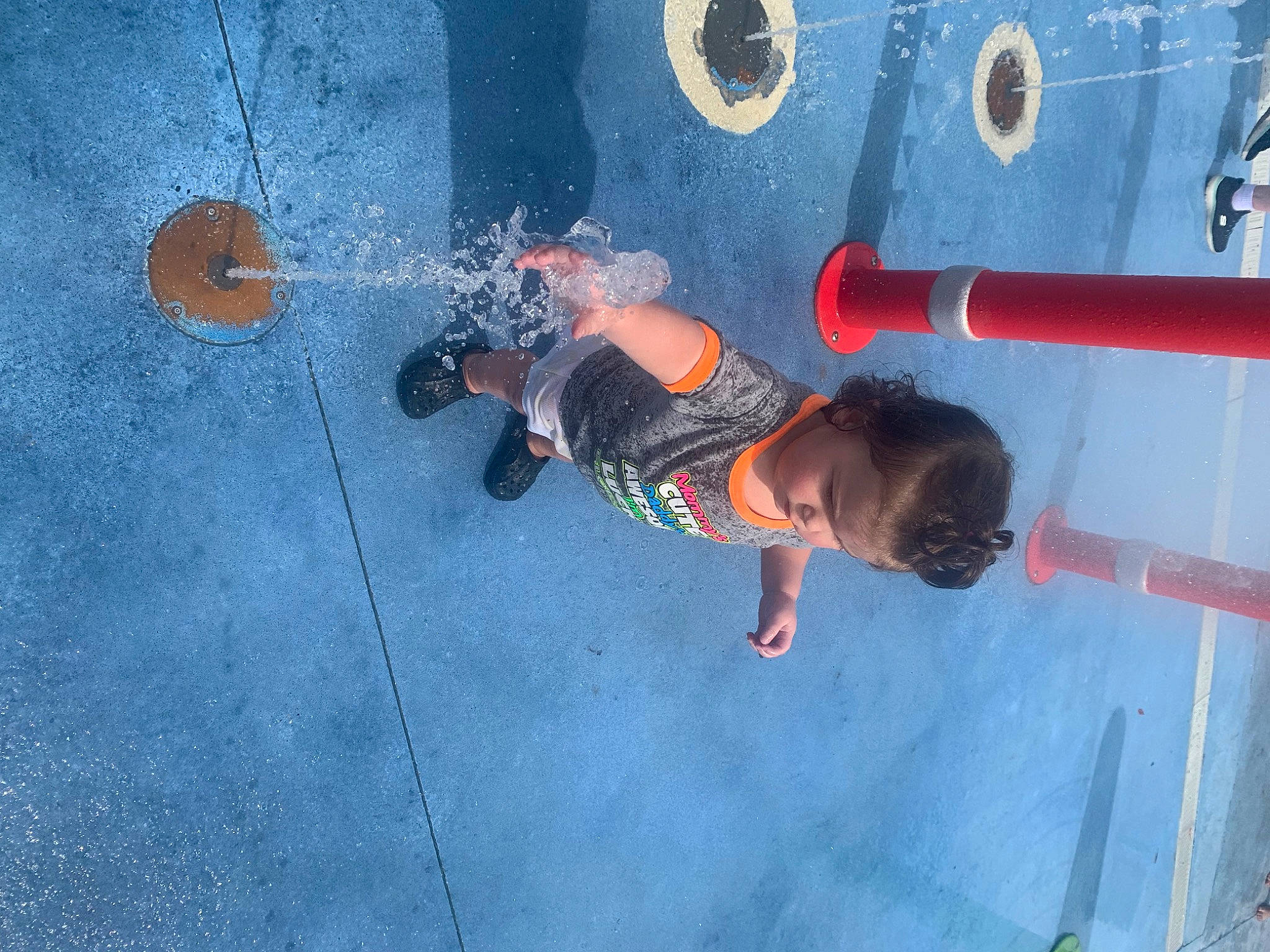 Alaina joined the competition — help win amazing prizes! adventure, asphalt, child, concrete, electric_blue, flooring, fun, leisure, line, outdoor_play_equipment, person, play, playground, recreation, shadow, shorts, sports, t_shirt, toddler, water