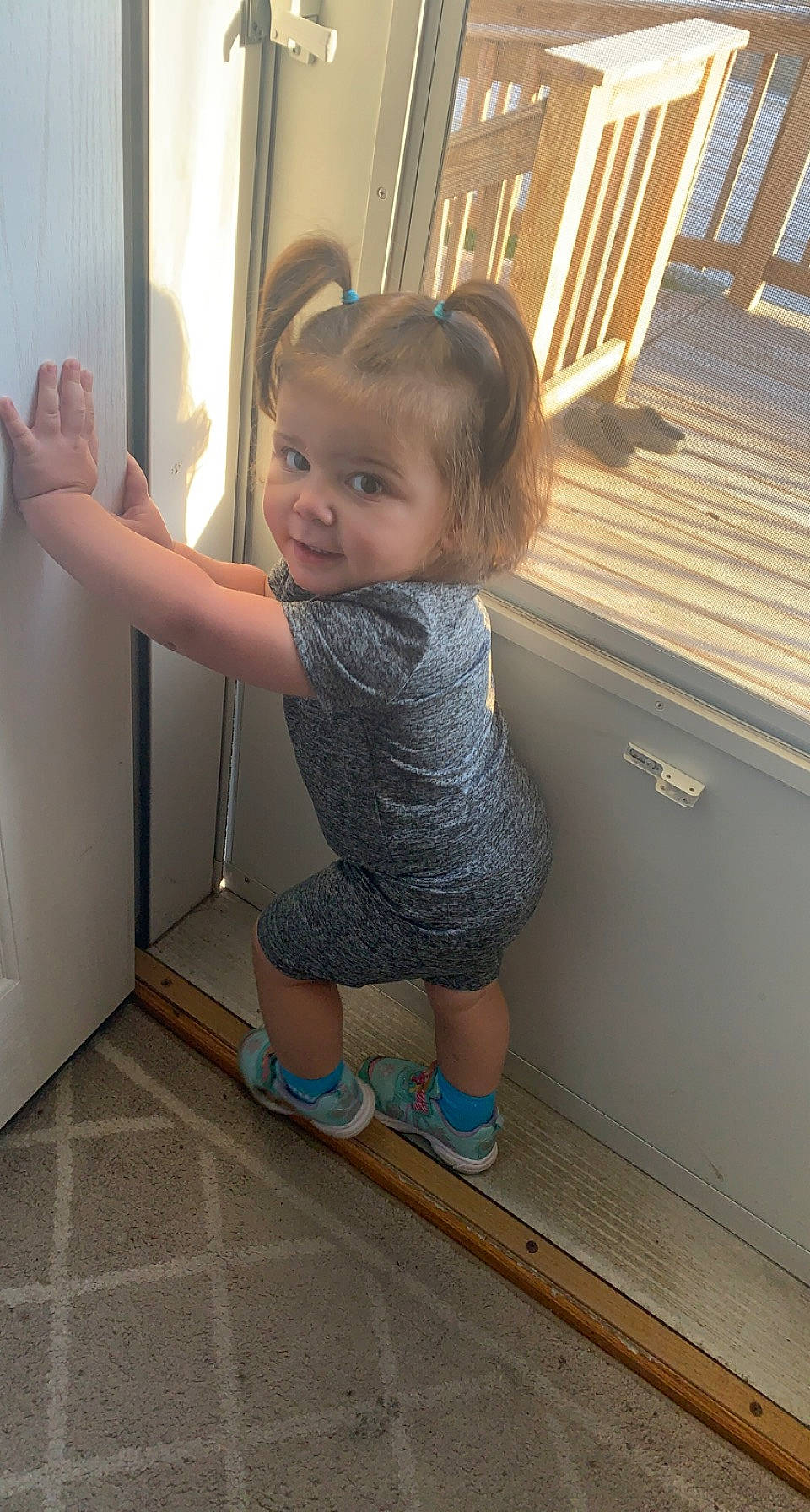 Alaina is registered to the contest to win money with this photo: arm, baby_toddler_clothing, finger, floor, flooring, foot, hair, hairstyle, hand, joint, knee, person, shoe, shoulder, skin, smile, sock, textile, thigh, toddler