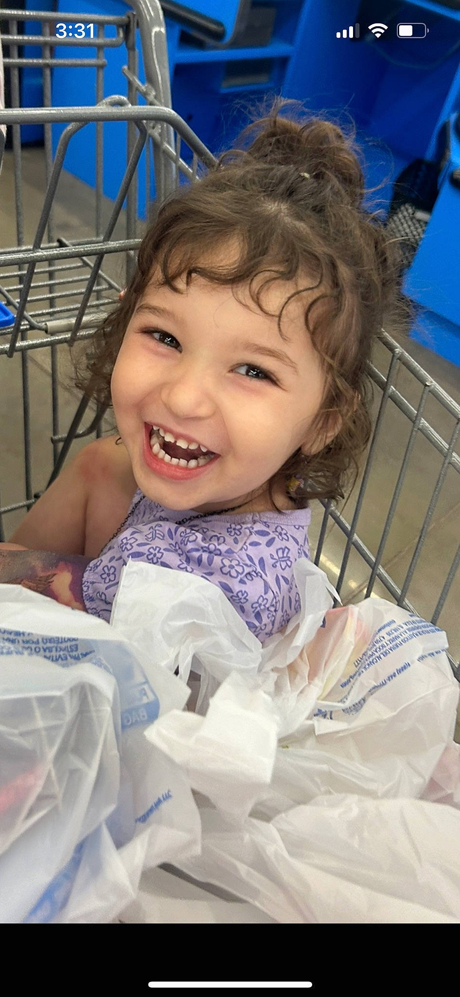 Ella is registered to the contest to win money with this photo: blue, cheek, child, electric_blue, facial_expression, fun, glove, happy, iris, joy, laugh, leisure, mouth, organ, person, portrait_photography, recreation, sitting, skin, smile