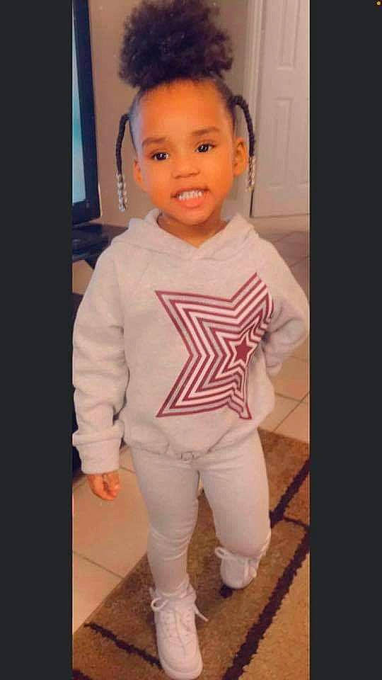Kaylin is registered to the contest to win money with this photo: baby_toddler_clothing, cheek, child, fashion_design, formal_wear, hair, hairstyle, happy, head, headgear, long_sleeved_t_shirt, magenta, neck, pattern, person, sleeve, smile, sportswear, t_shirt, toddler