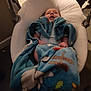 Zane joined the competition — help win amazing prizes! baby, blanket, infant, baby_seat, cushion, blue_blanket, indoor, person, child, sleepwear, newborn, wrapped, soft, cute, resting, young_child, infancy, baby_clothes, lying_down, warm