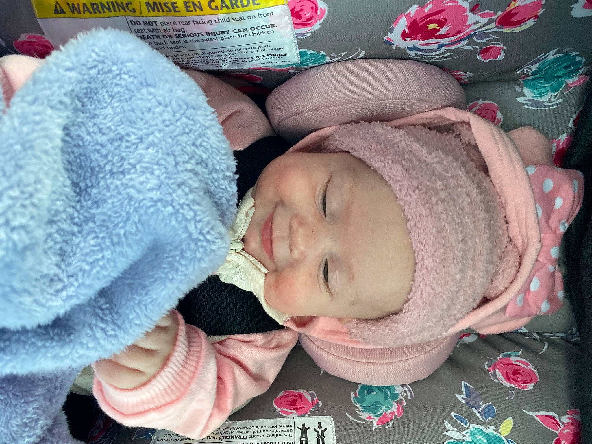 Rylee is registered to the contest to win money with this photo: baby, baby_products, baby_sleeping, baby_toddler_clothing, cap, cheek, child, comfort, eye, eyelash, happy, headgear, headwear, knit_cap, lip, mouth, nose, person, pink, skin