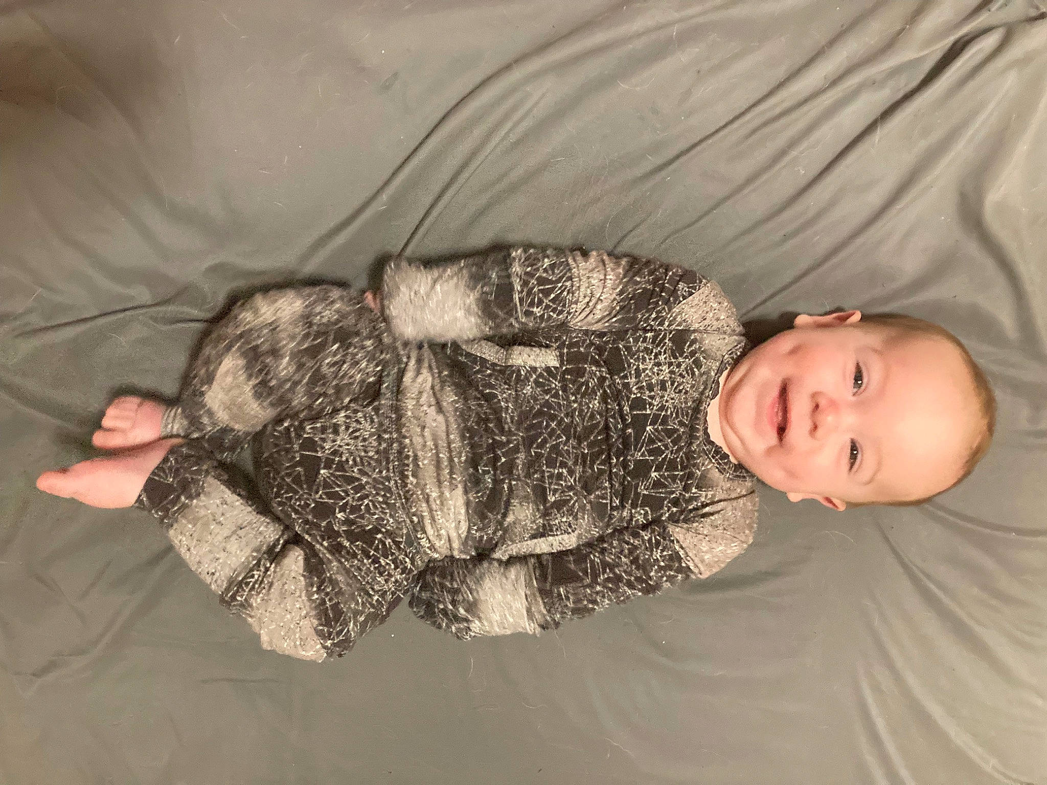 Canyon is registered to the contest to win money with this photo: baby, baby_toddler_clothing, bedtime, comfort, couch, face, fur, human_body, human_leg, joy, linens, nap, pattern, person, sitting, sleep, sleeve, toddler, vertebrate, wood