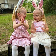 Brylee is registered to the contest to win money with this photo: bunny_ears, child, cute, easter, footwear, friendship, girl, grass, happy, house, nature, outdoor, pink_dress, playful, portrait, smiling, spring, tree, white_tights, wooden_log
