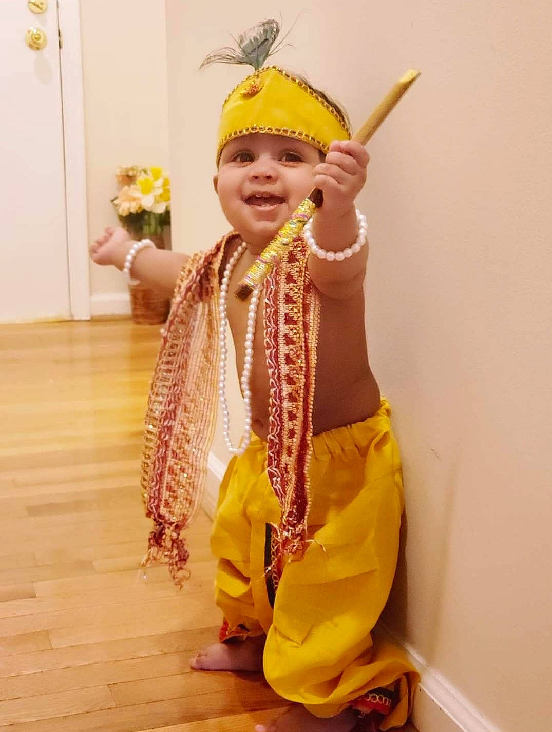 Rhea joined the competition — help win amazing prizes! arm, child, costume, costume_hat, dance, entertainment, event, fashion_design, flooring, fun, happy, headwear, jewellery, joy, necklace, peach, performance_art, performing_arts, person, smile