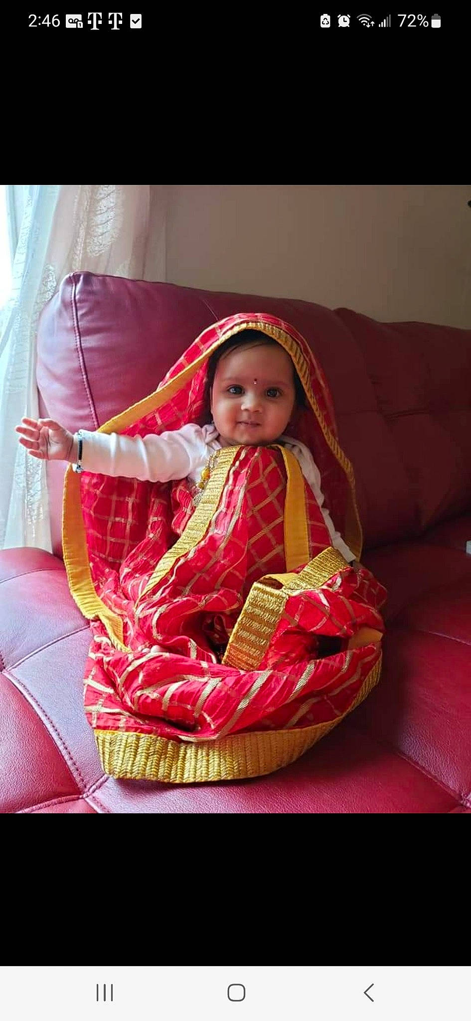 Rhea is registered to the contest to win money with this photo: baby, baby_carriage, baby_products, baby_toddler_clothing, basket, carmine, chair, child, comfort, event, fun, happy, headwear, lap, magenta, pattern, person, room, sitting, smile