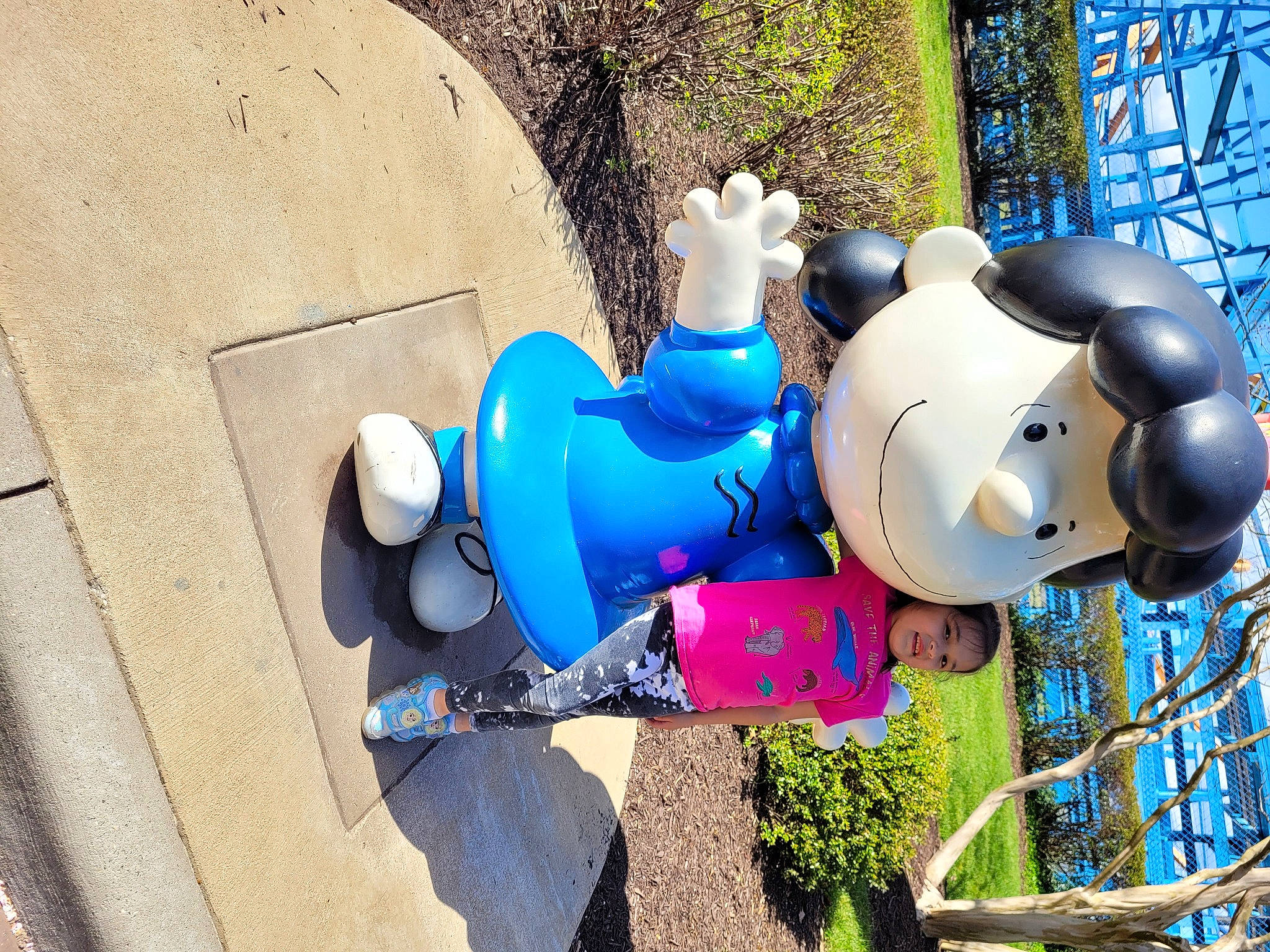 Mavis is registered to the contest to win money with this photo: art, carmine, city, concrete, electric_blue, fun, games, gas, lawn_ornament, leisure, machine, metal, person, personal_protective_equipment, plant, plastic, recreation, sculpture, statue, vacation