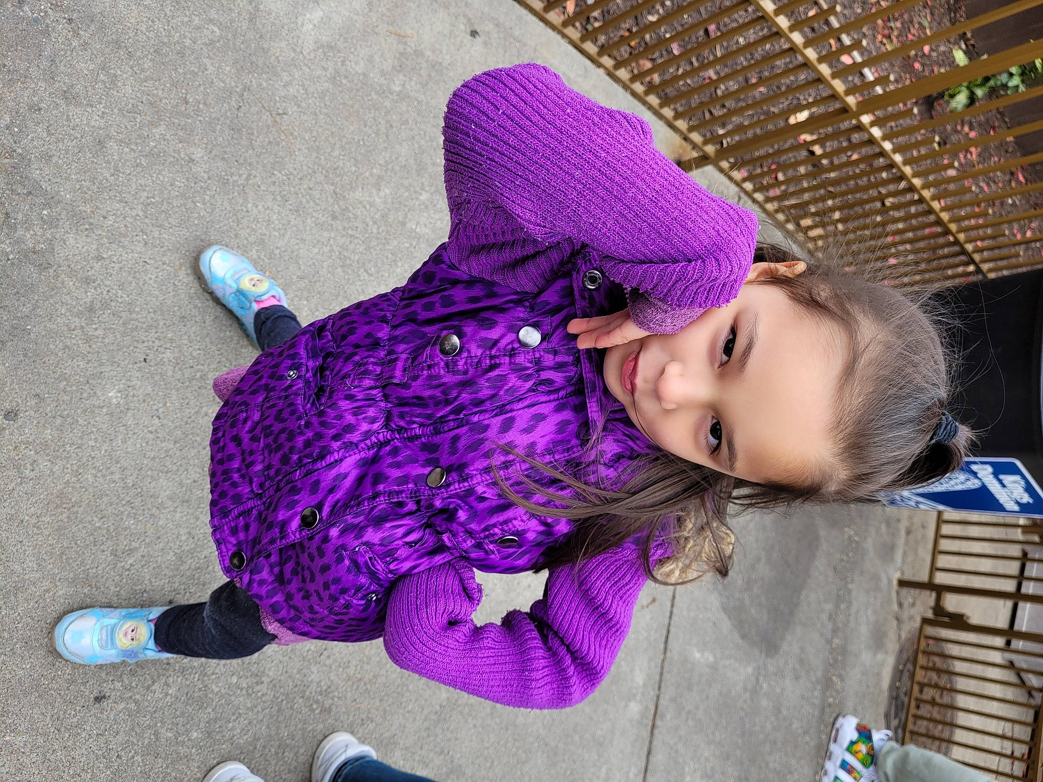 Mavis is registered to the contest to win money with this photo: baby_toddler_clothing, child, electric_blue, fashion_accessory, fun, fur, leisure, magenta, pattern, person, pink, purple, sock, toddler, violet