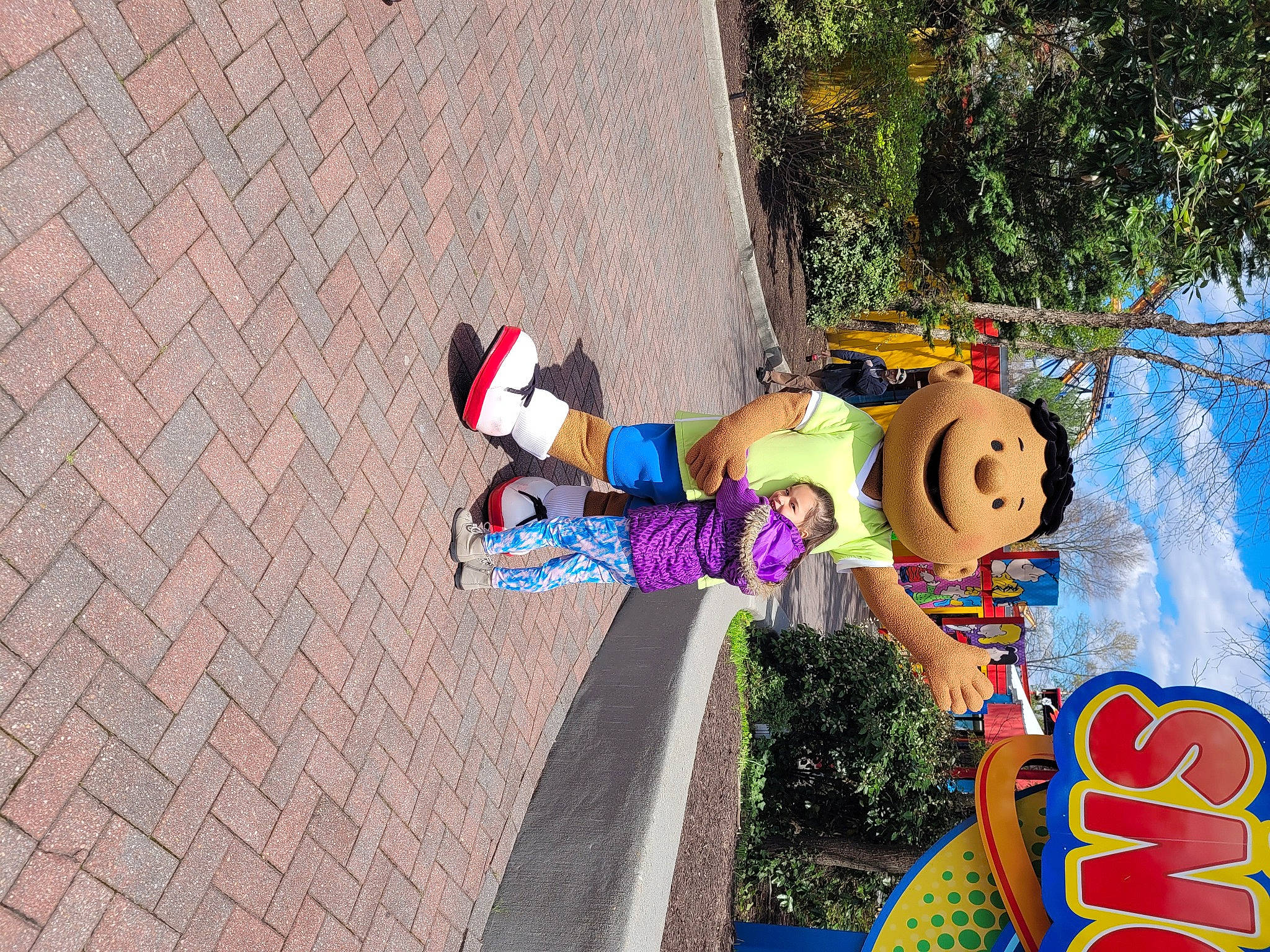 Mavis joined the competition — help win amazing prizes! art, asphalt, child, city, concrete, fun, grass, happy, joy, leisure, mural, person, plant, public_space, recreation, road, road_surface, sidewalk, street, toy