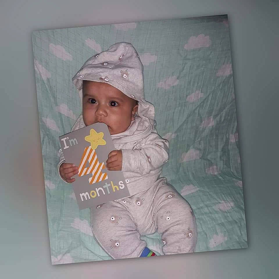 Bear is registered to the contest to win money with this photo: baby, child, headwear, person, toddler