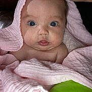 Sophia joined the competition — help win amazing prizes! baby, blanket, bonnet, clothing, couch, cushion, face, furniture, happy, hat, head, homedecor, hood, newborn, person, photography, portrait, quilt, smile, towel