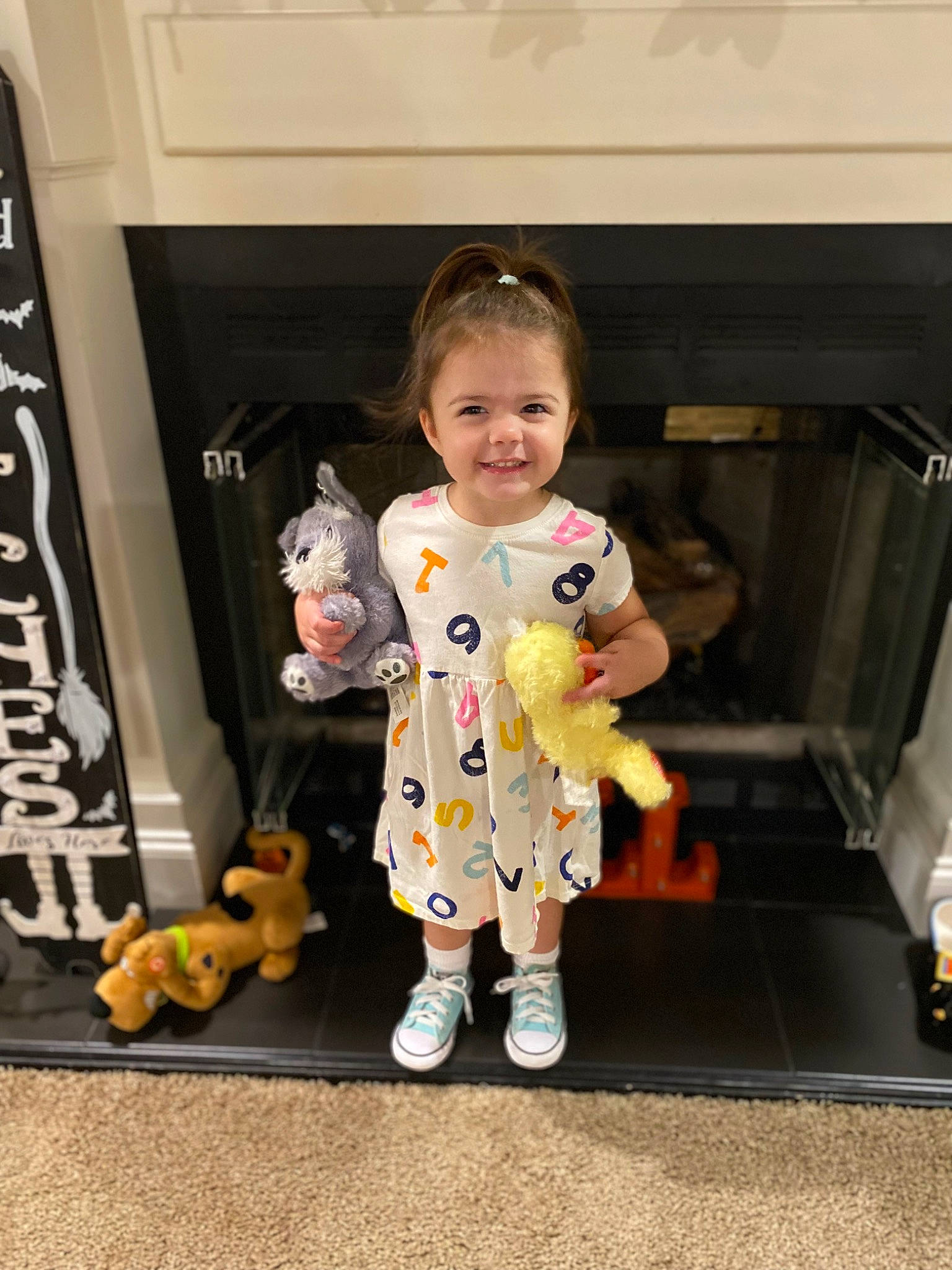Hattie joined the competition — help win amazing prizes! baby, baby_toddler_clothing, child, costume, flooring, fun, fur, happy, joy, nightwear, pajamas, person, play, room, sitting, sleeve, smile, standing, stuffed_toy, toddler