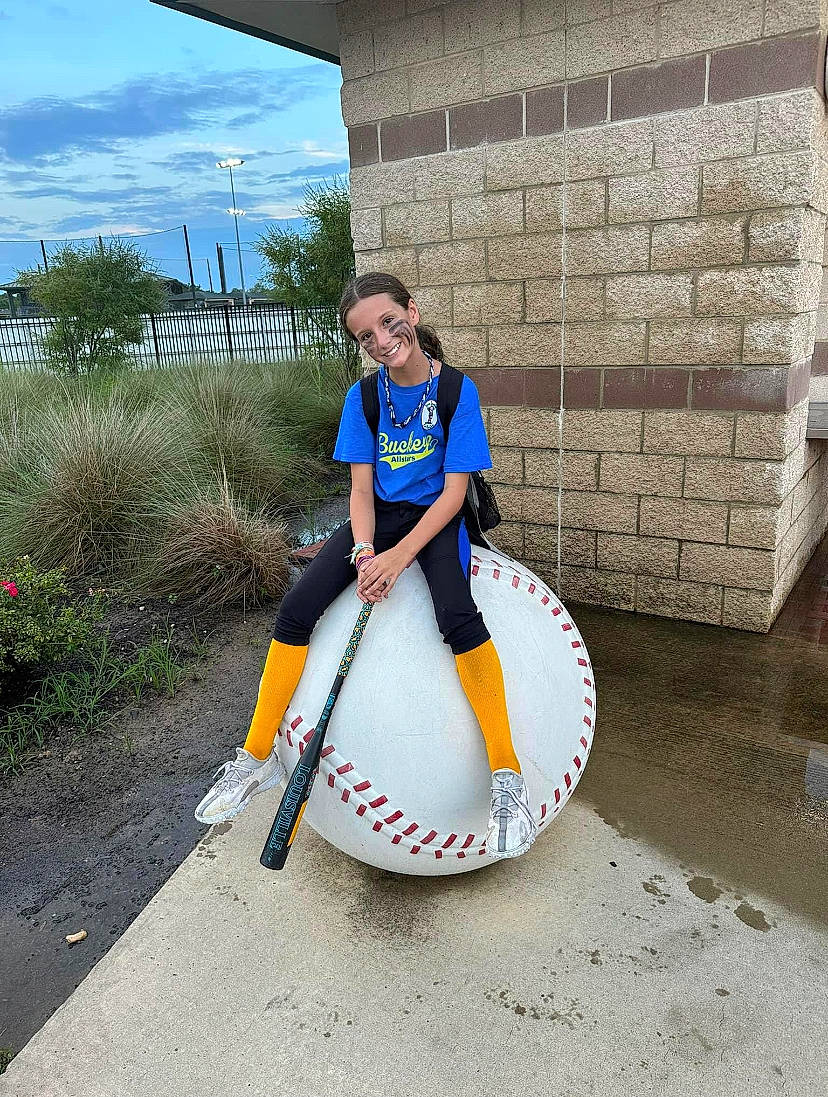 Addison joined the competition — help win amazing prizes! asphalt, automotive_tire, automotive_wheel_system, cloud, concrete, electric_blue, human_leg, joy, leisure, membranophone, musical_instrument, person, personal_protective_equipment, plant, recreation, road, road_surface, sitting, sky, smile