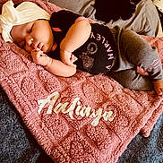 Aaliayh is registered to the contest to win money with this photo: baby, bed, bedroom, blanket, clothing, couch, cushion, face, furniture, head, homedecor, indoors, newborn, person, photography, portrait, quilt, room, sleeping, t_shirt