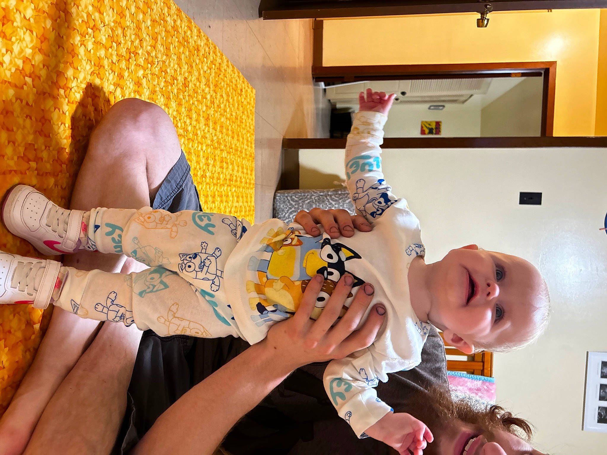 Lilah joined the competition — help win amazing prizes! baby, elbow, finger, fun, gesture, hand, happy, home_appliance, human_leg, kitchen_appliance, nail, orange, person, refrigerator, thigh, thumb, toddler, visual_arts, wood, wrist