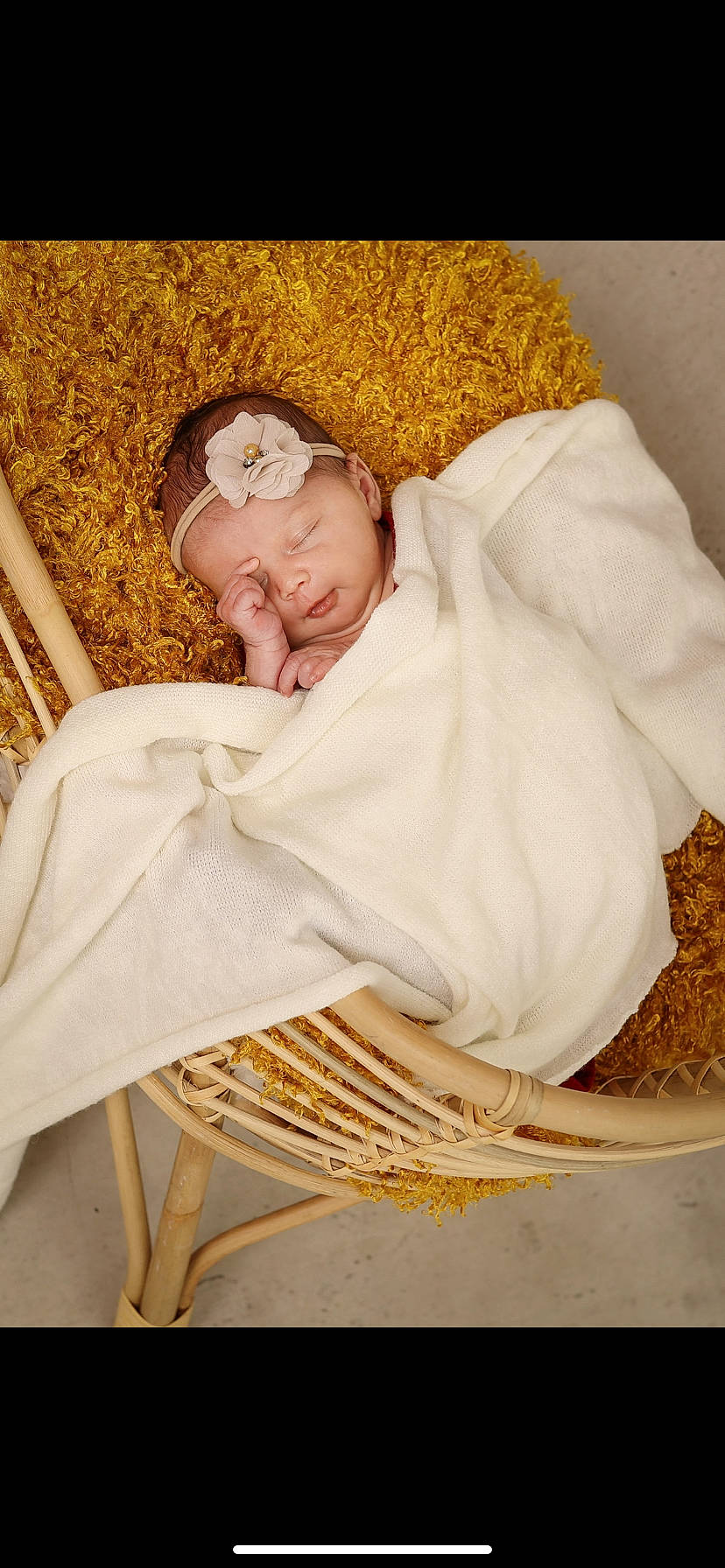 Myla participe au concours pour gagner de l'argent avec cette photo : baby, baby_products, baby_sleeping, chair, child, comfort, fur, grass, happy, headwear, linens, pattern, peach, people_in_nature, person, room, sitting, textile, toddler, wood