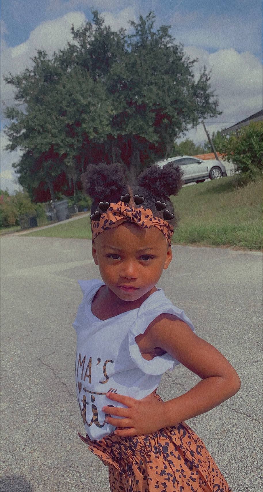 Journie is registered to the contest to win money with this photo: asphalt, cap, car, eyewear, fun, grass, hair, happy, head, headband, headpiece, headwear, jewellery, landscape, leisure, person, plant, road, sky, summer