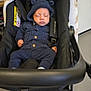 Isa Elah Raah joined the competition — help win amazing prizes! baby, sleeping, stroller, hoodie, knitwear, bear_ears, blanket, indoor, child, cozy, black, clothing, infant, seat, comfort, peaceful, cute, bundle, person, portrait