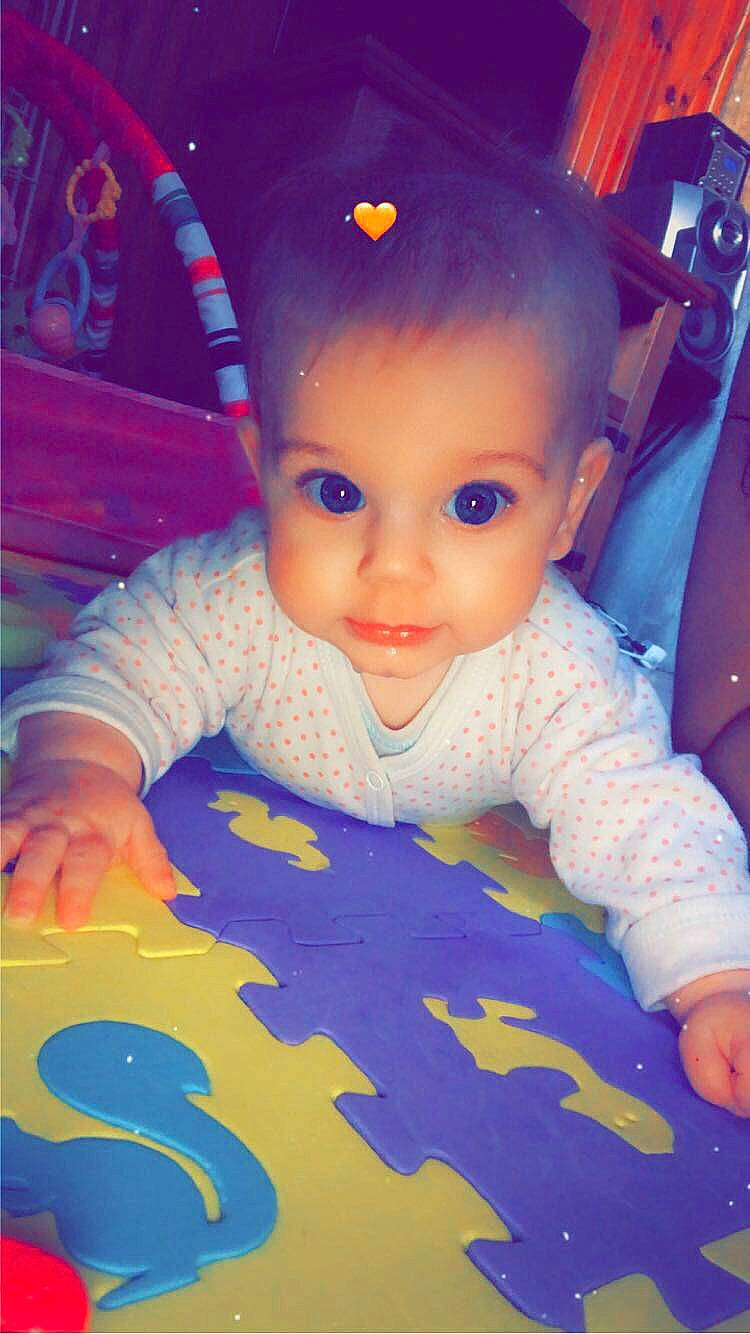 Léna participe au concours pour gagner de l'argent avec cette photo : baby, baby_products, baby_toys, cheek, child, eye, face, forehead, fun, head, nose, person, play, product, skin, smile, space, toddler