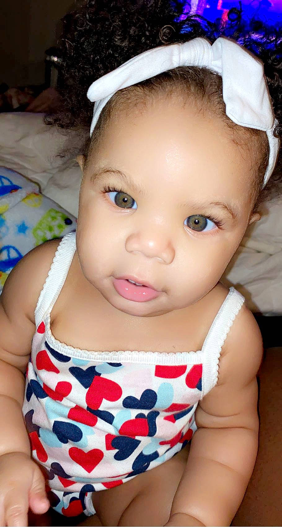 Alayah is registered to the contest to win money with this photo: baby, baby_toddler_clothing, blue, cheek, ear, eye, eyebrow, eyelash, flash_photography, forehead, happy, headgear, human_body, iris, lip, mouth, neck, nose, person, skin