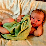Atticus joined the competition — help win amazing prizes! baby, baby_skin, blanket, child, comfort, cute, expression, face, foot, green_cloth, hand, indoors, infant, lying_down, newborn, portrait, relaxed, resting, skin, soft_texture