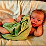 baby, baby_skin, blanket, child, comfort, cute, expression, face, foot, green_cloth, hand, indoors, infant, lying_down, newborn, portrait, relaxed, resting, skin, soft_texture