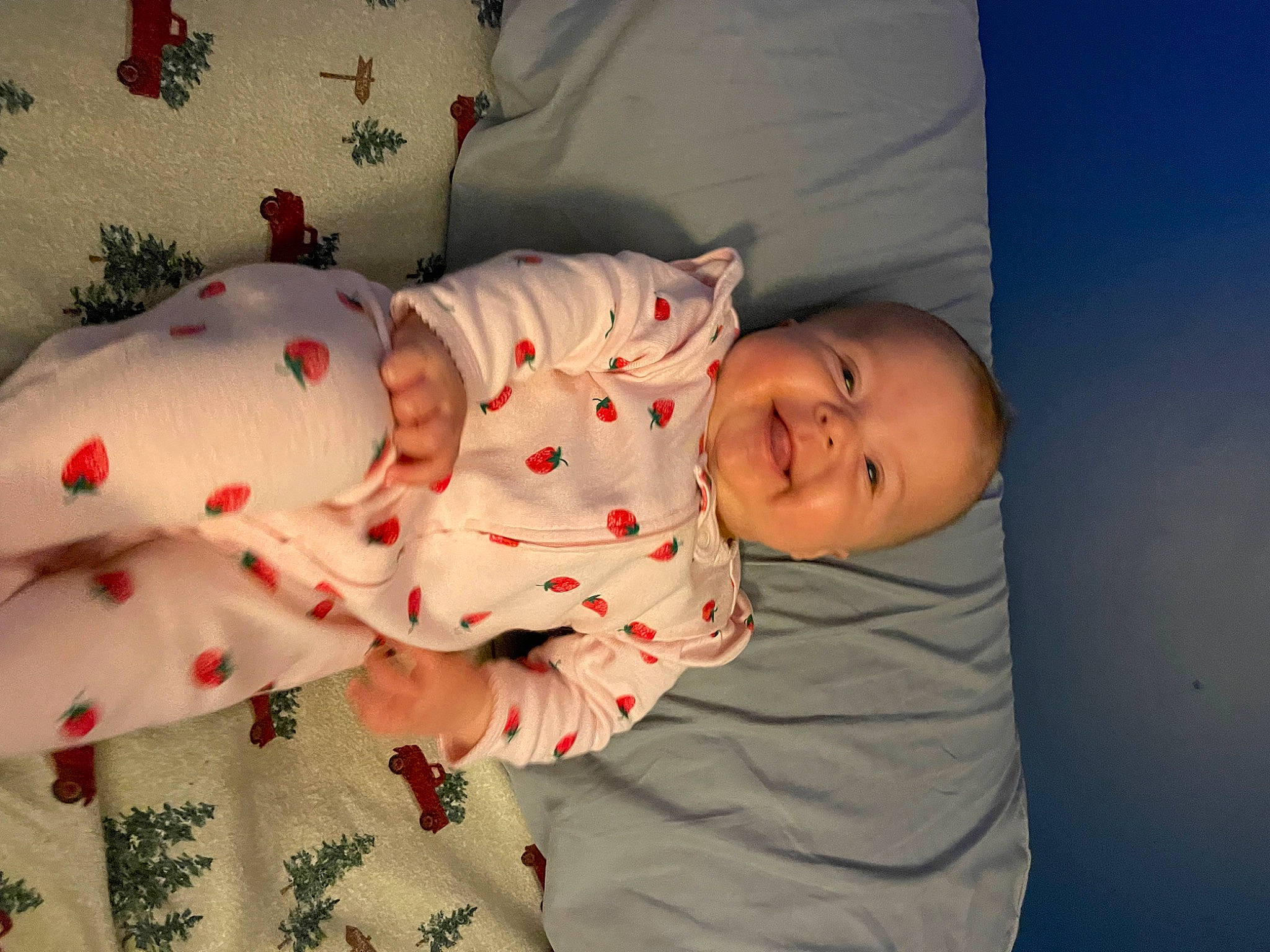 Jolene is registered to the contest to win money with this photo: baby, baby_products, baby_safety, baby_toddler_clothing, bedding, carmine, child, comfort, happy, linens, nightwear, pattern, person, room, sitting, skin, sleeve, smile, textile, toddler