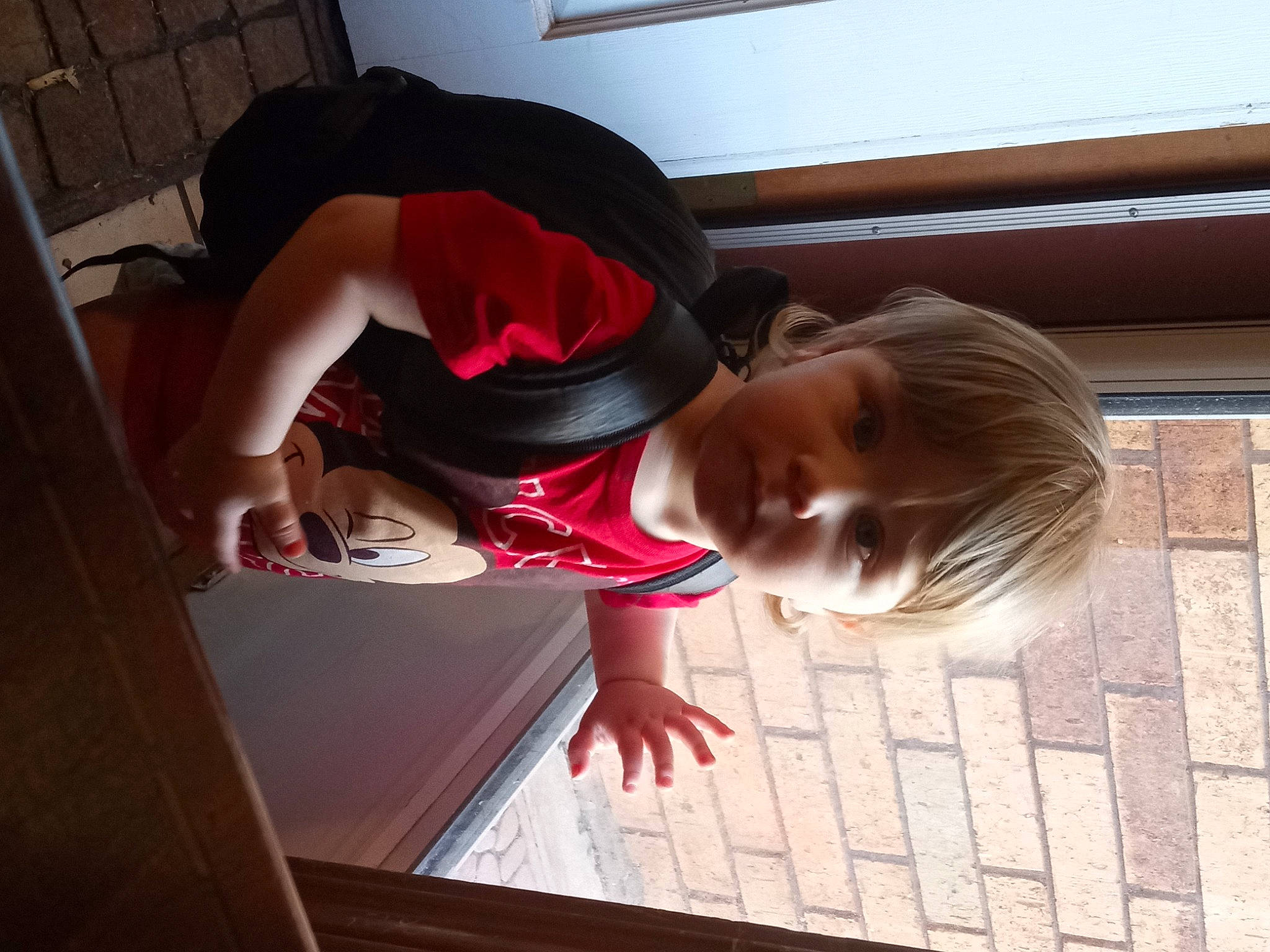 Colton is registered to the contest to win money with this photo: child, comfort, elbow, flooring, fun, gesture, happy, hardwood, person, room, sunglasses, toddler, window, wood