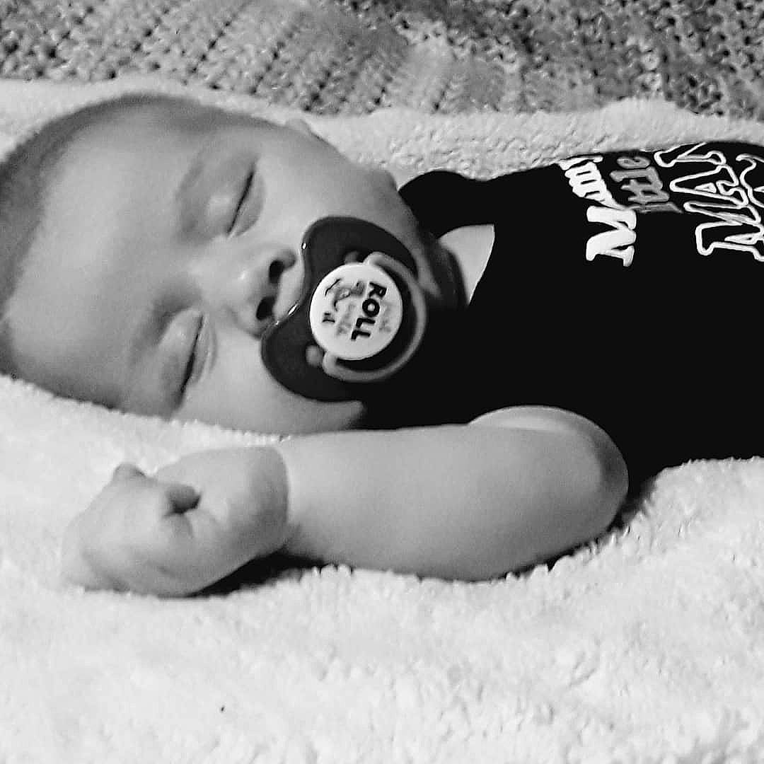 Colton joined the competition — help win amazing prizes! arm, baby, baby_sleeping, baby_toddler_clothing, black, black_and_white, child, comfort, eyelash, finger, flash_photography, font, hand, happy, headgear, linens, monochrome, monochrome_photography, pattern, person