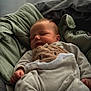 Rafaël a rejoint le concours — aidez-le/la à gagner de superbes lots ! baby, sleeping, blanket, soft, cozy, infant, cute, child, clothing, indoors, peaceful, portrait, newborn, face, hand, natural_light, warm, resting, cushion, comfort