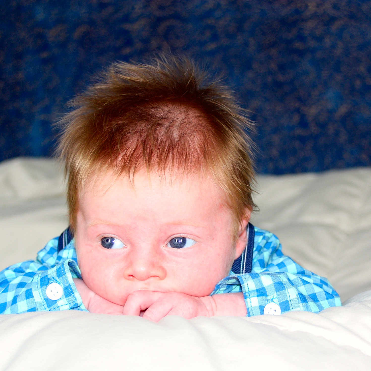 Aidyn is registered to the contest to win money with this photo: baby, bed, bedtime, blue, cheek, child, chin, ear, eye, face, forehead, iris, lip, mouth, nose, person, photography, skin, smile, toddler