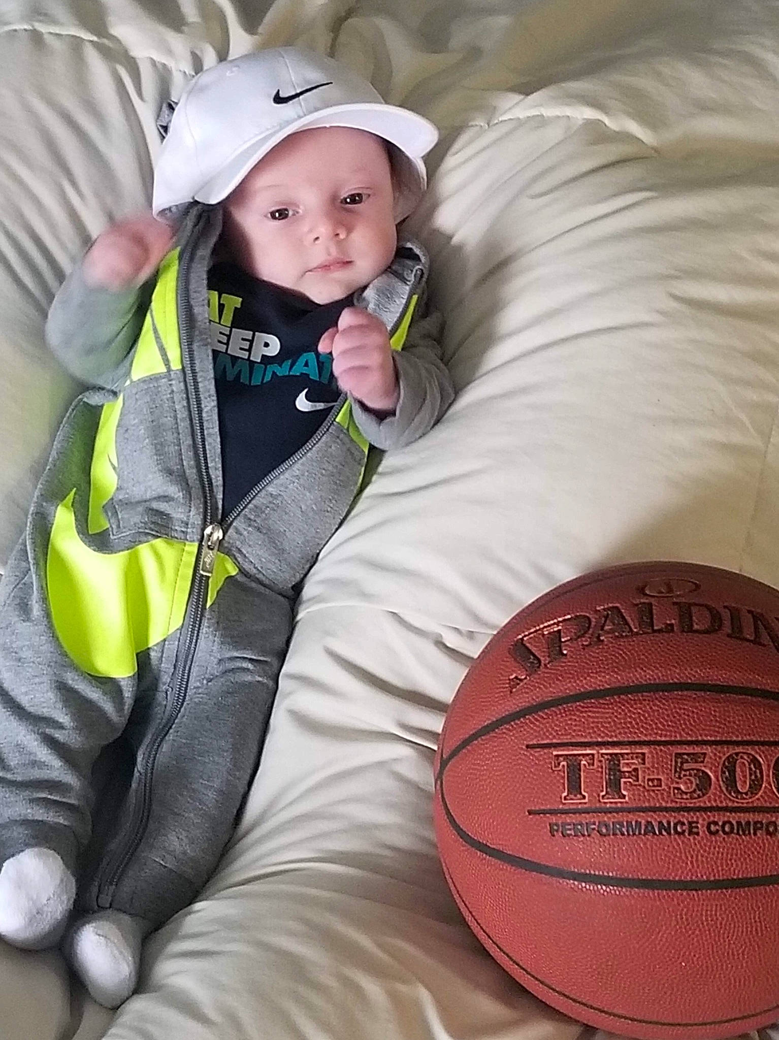 Aidyn joined the competition — help win amazing prizes! ball, cap, child, headgear, outerwear, person, recreation, sitting, vacation, yellow