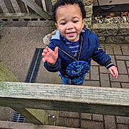 Taavi joined the competition — help win amazing prizes! architecture, baby, bodypart, building, clothing, coat, face, finger, hand, handrail, head, jacket, pants, path, person, photography, portrait, slate, walkway, wood