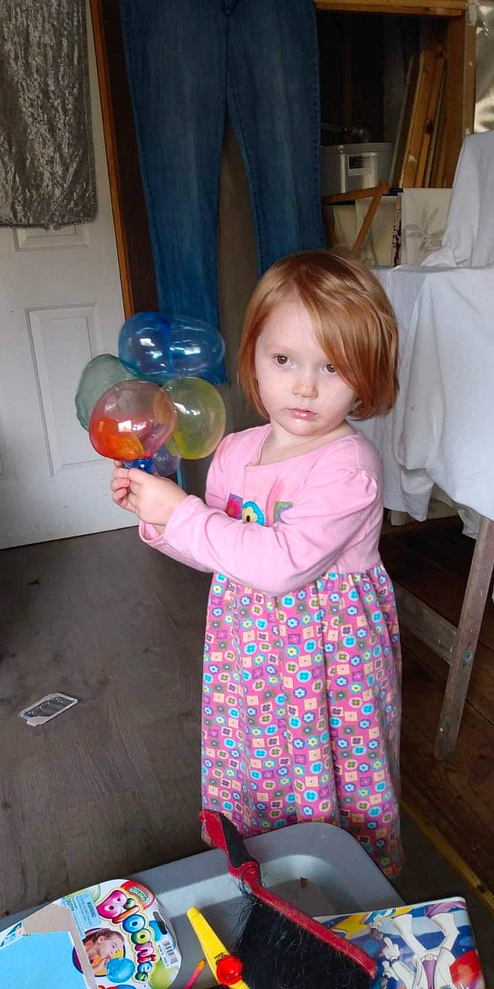 Paisley joined the competition — help win amazing prizes! baby, baby_products, baby_toddler_clothing, balloon, child, electric_blue, fun, human_leg, joint, magenta, party_supply, person, pink, play, product, room, sock, standing, toddler, toy