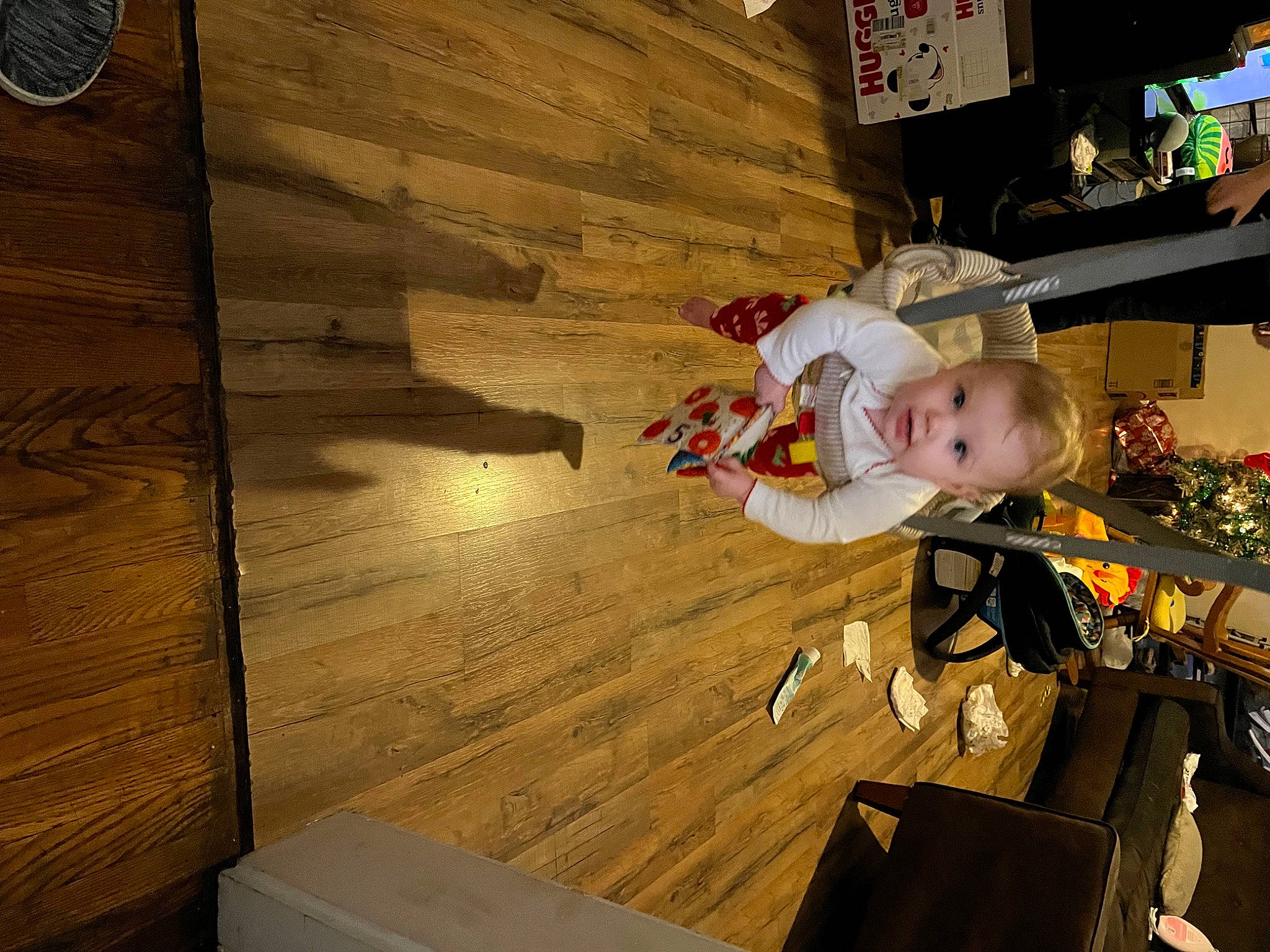 Carolina is registered to the contest to win money with this photo: child, event, fictional_character, flooring, fun, hardwood, lumber, person, plank, plywood, recreation, room, shadow, toddler, tree, varnish, wood, wood_flooring, wood_stain