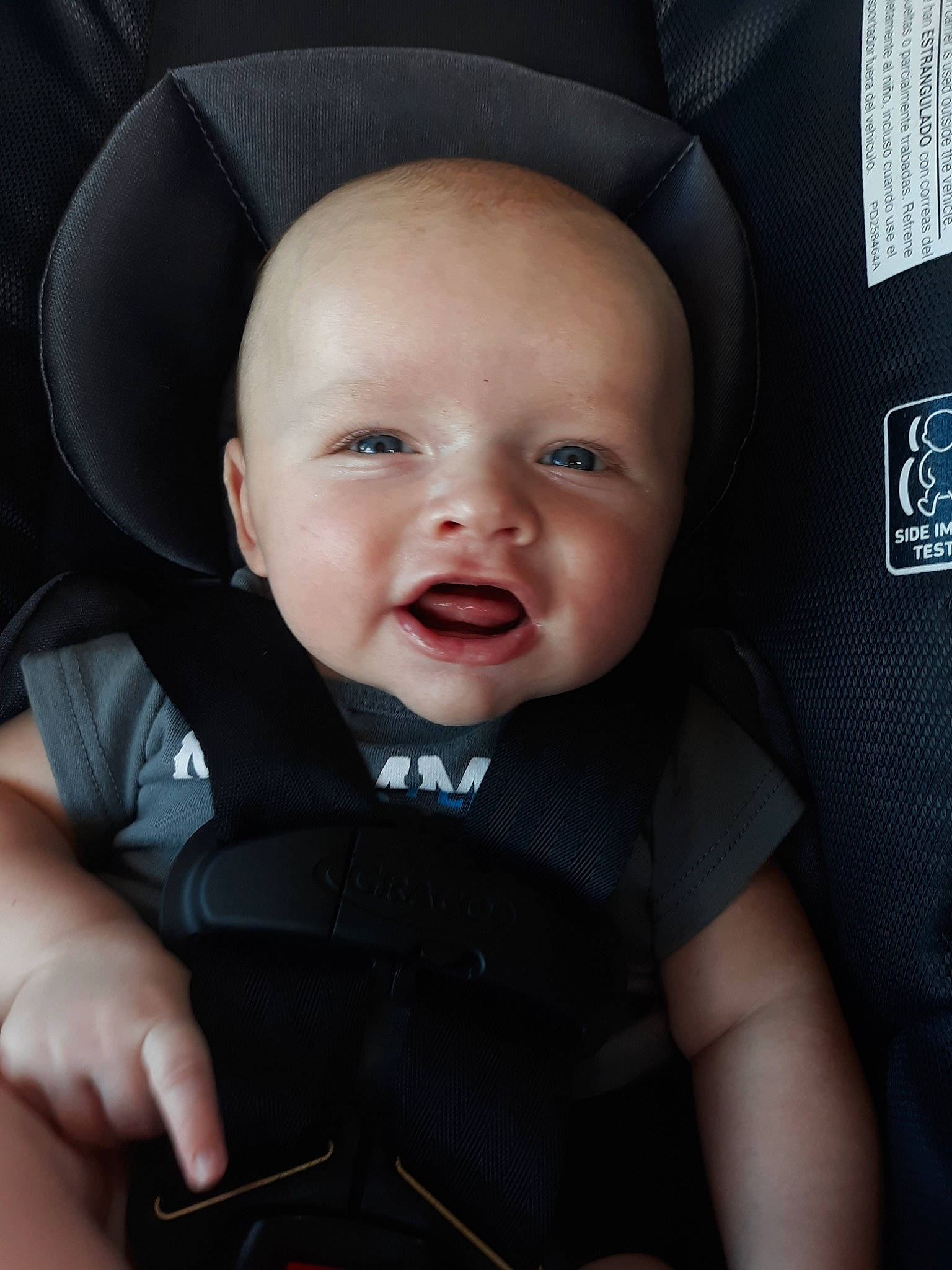 Cullen is registered to the contest to win money with this photo: auto_part, baby, baby_carriage, baby_in_car_seat, baby_products, car_seat, cheek, child, chin, eye, face, facial_expression, head, headgear, lip, nose, person, product, skin, smile