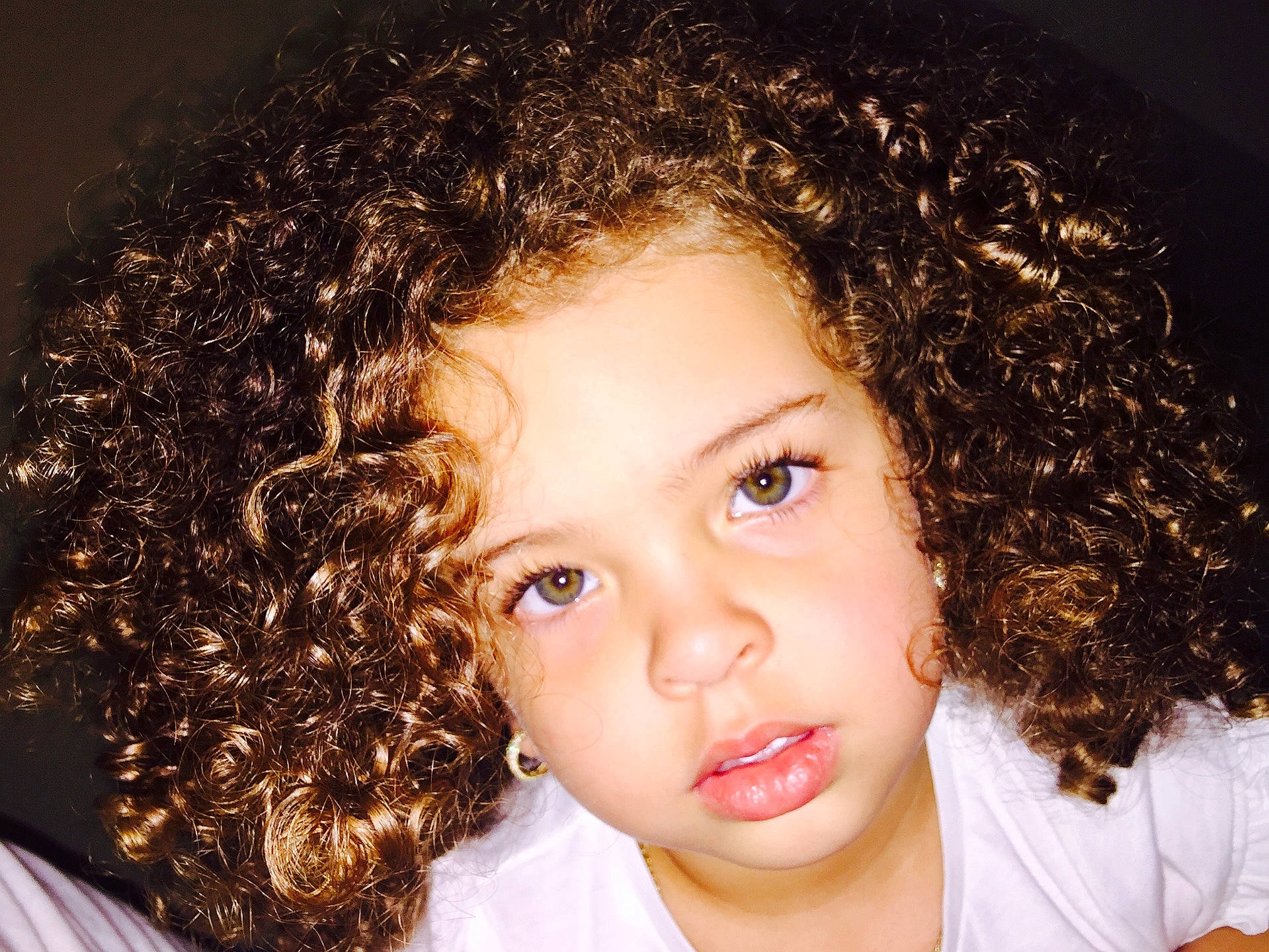 Angelique Guerrero is registered to the contest to win money with this photo: beauty, black_hair, brown_hair, cheek, child, child_model, close_up, eye, face, forehead, girl, hair, hairstyle, head, human_hair_color, jheri_curl, lip, long_hair, person, portrait