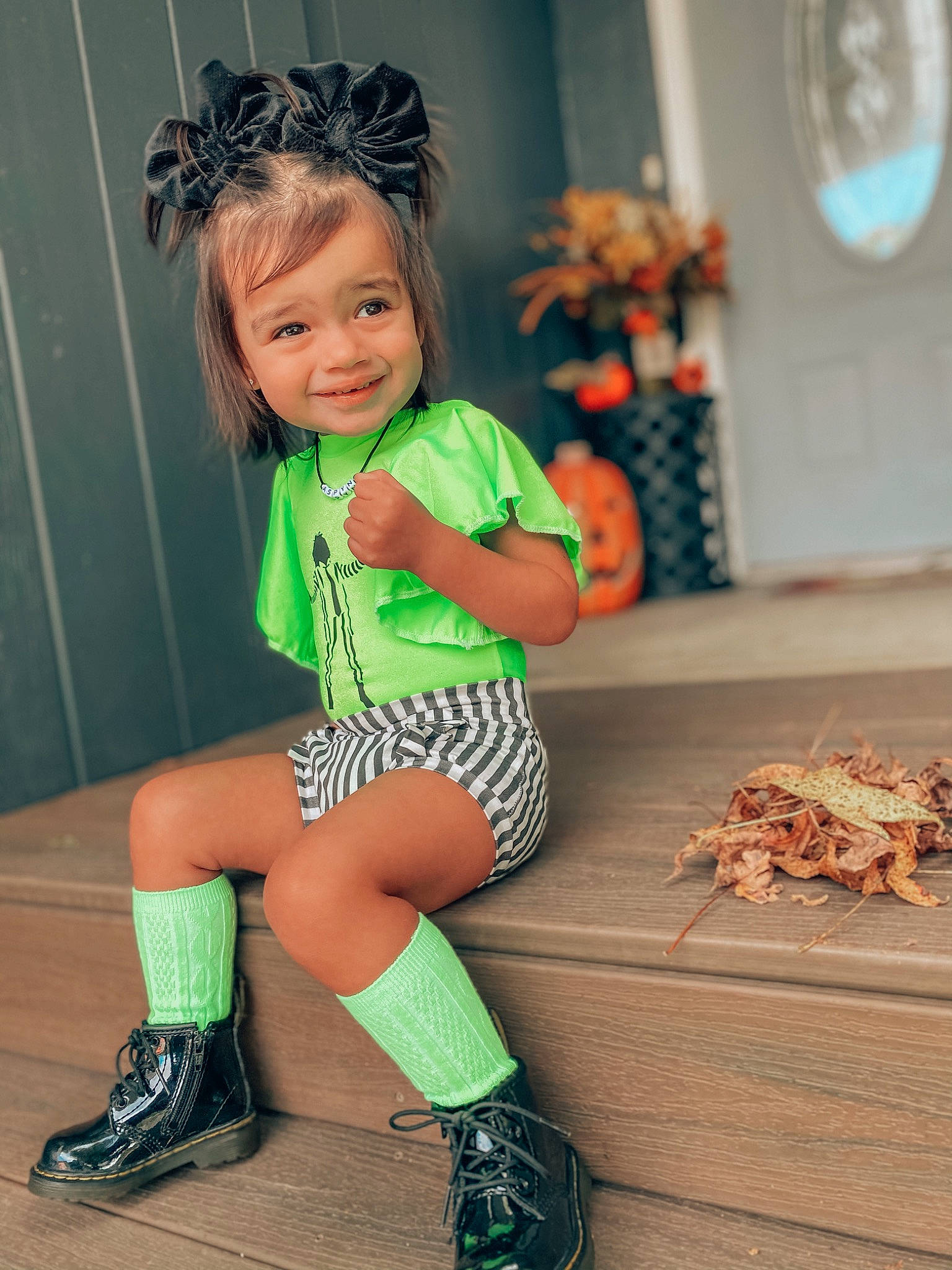 Aspyn is registered to the contest to win money with this photo: baby_toddler_clothing, blond, brown_hair, child, dress, fashion_accessory, foot, footwear, happy, human_leg, joy, knee, leg, pattern, person, sleeve, smile, sock, thigh, tie