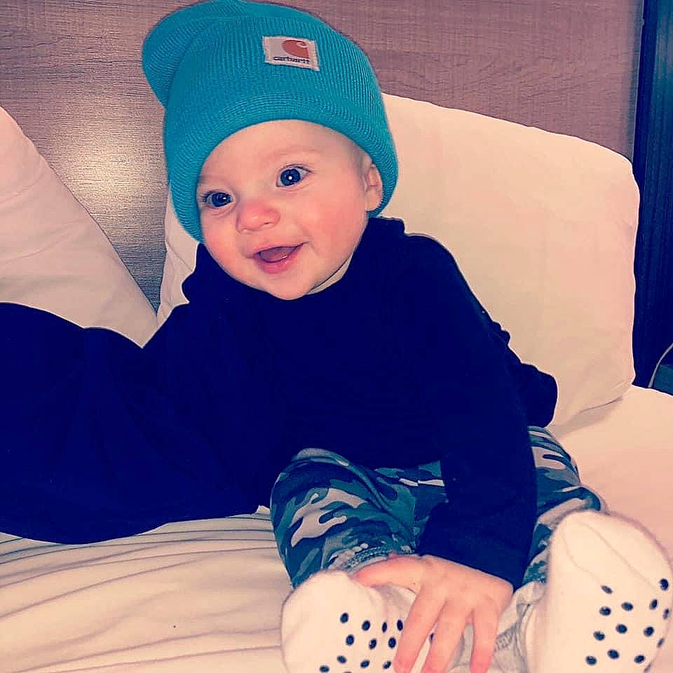 Zeplyn is registered to the contest to win money with this photo: baby, baby_toddler_clothing, blue, cap, child, comfort, cool, costume_hat, electric_blue, face, happy, headgear, headwear, knee, pattern, person, sleeve, smile, t_shirt, thigh
