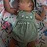 Jaliyah joined the competition — help win amazing prizes! baby, sleeping, infant, blanket, pacifier, headband, green_clothing, floral_pattern, soft_toys, cute, peaceful, indoors, cozy, child, newborn, socks, resting, portrait, closeup, nursery