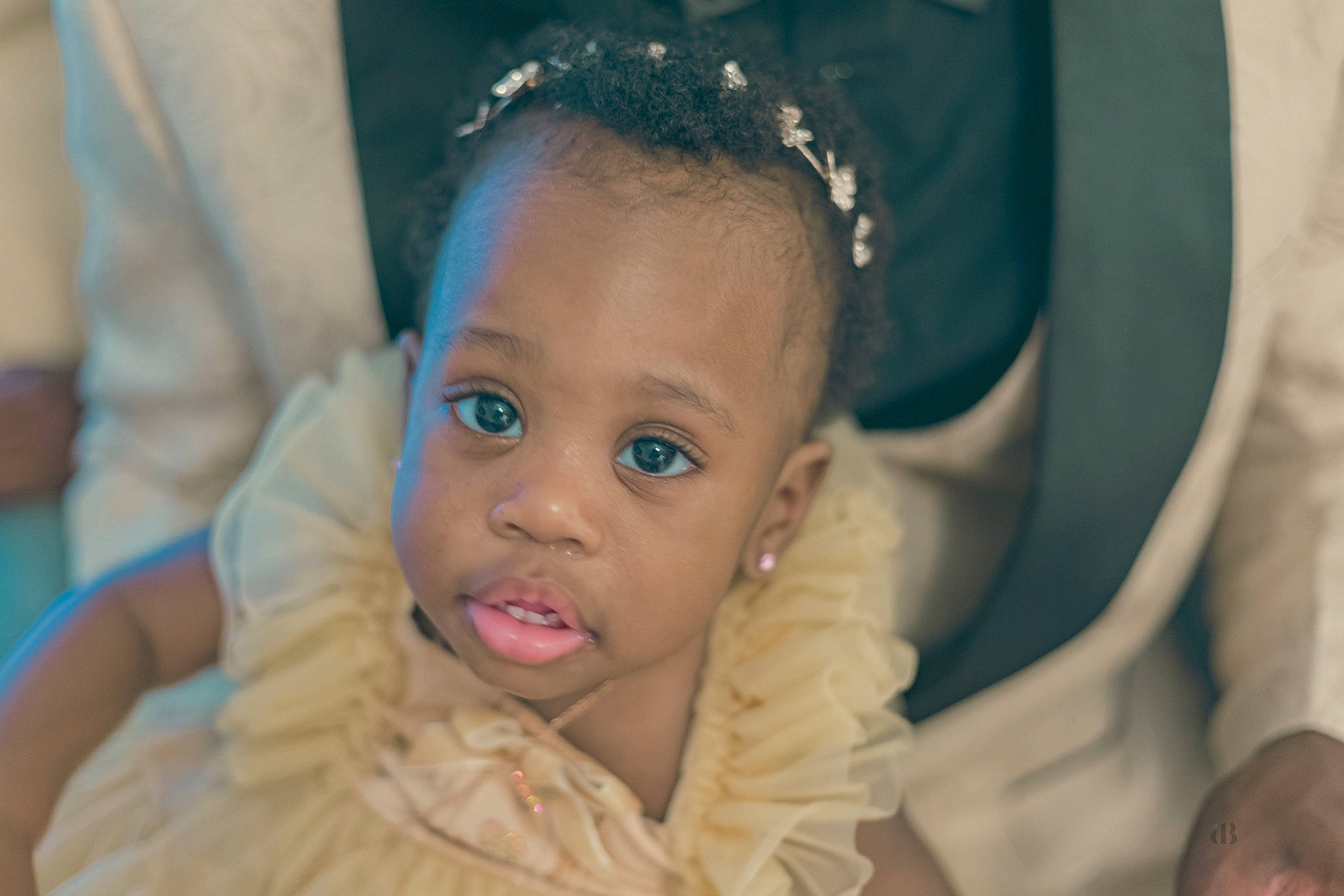 Chaia Grace is registered to the contest to win money with this photo: baby, black_hair, cheek, child, ear, event, eyebrow, eyelash, flash_photography, fun, gesture, happy, headpiece, iris, nose, organ, person, sitting, skin, smile