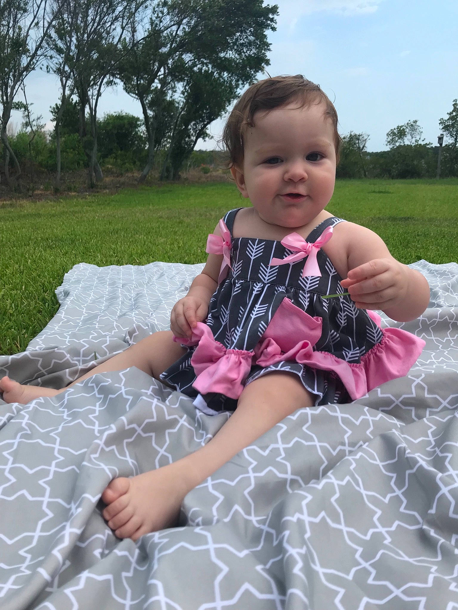 Emmersyn joined the competition — help win amazing prizes! child, grass, leisure, person, pink, sitting, summer, toddler, vacation