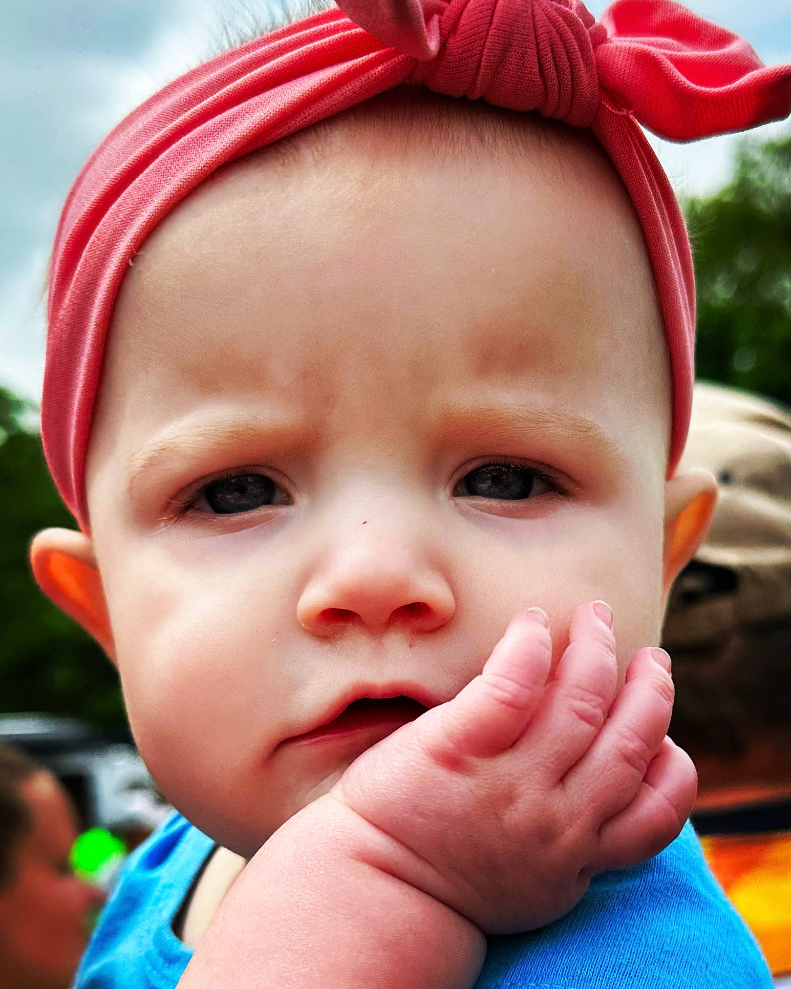 Hailey is registered to the contest to win money with this photo: baby, cheek, chin, clothing, eyebrow, eyelash, face, facial_expression, gesture, happy, human, light, lip, mouth, nose, organ, person, photograph, pink, skin
