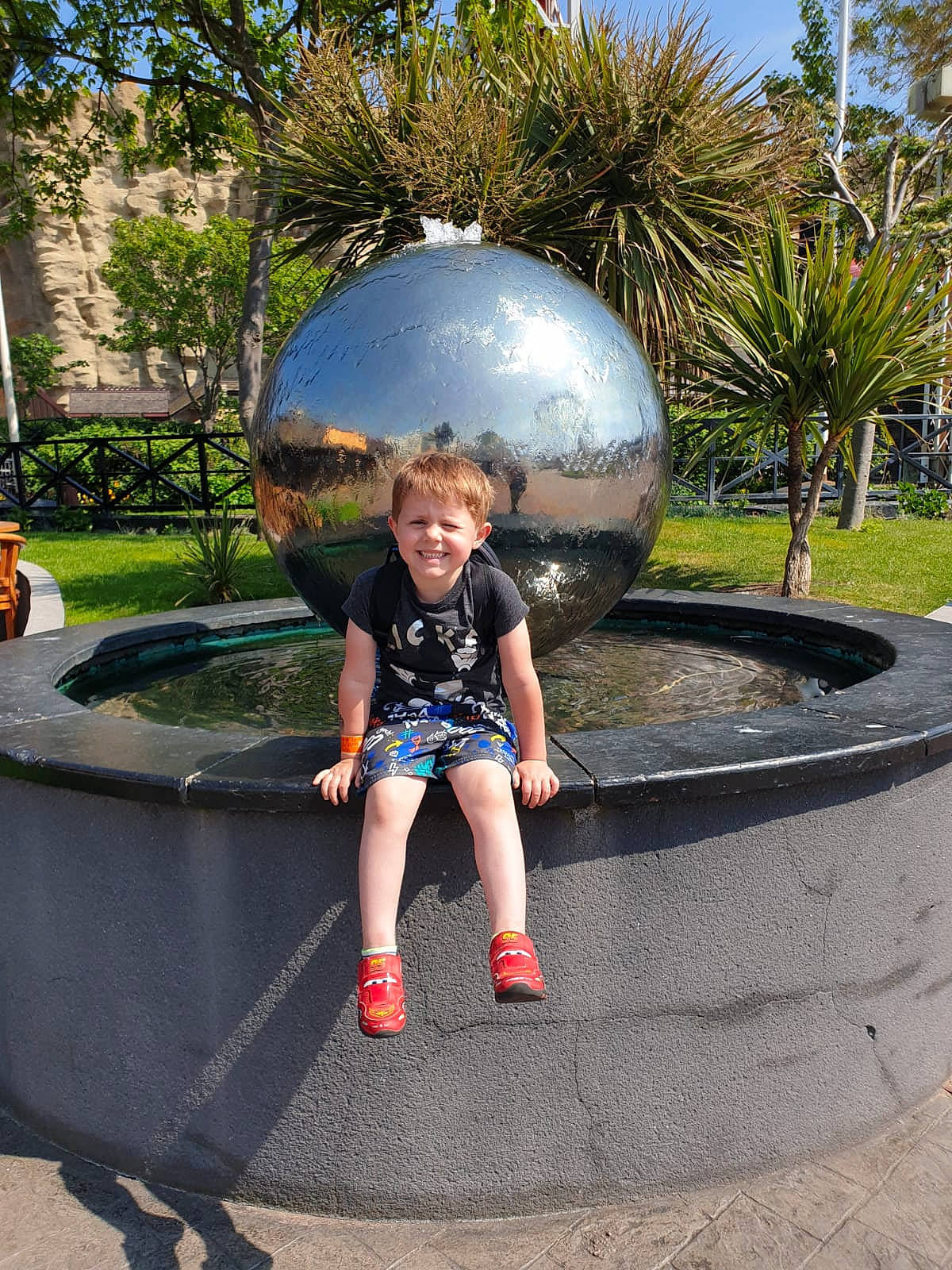 Logan James is registered to the contest to win money with this photo: joy, leisure, person, sphere, vacation, water_feature, world